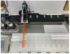 検査装置内でワークの形状をレーザー測長する例